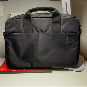 Incase 13" laptop bag with carrying handles, lightweight functional sleeve.